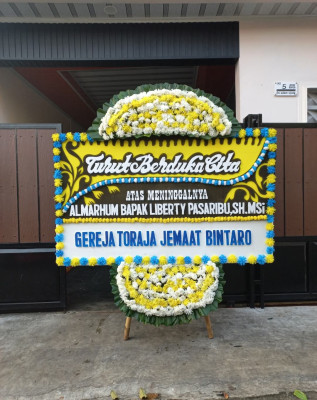 Papan Bunga Duka di Taratak Padang Kampuang
